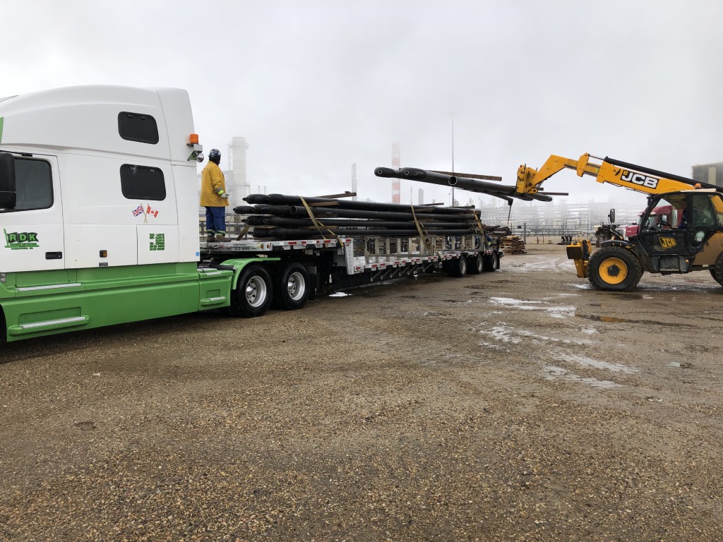 Truck loaded with scrap industrial components at plant site